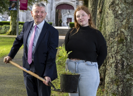 Peter McHugh with oak sapling on campus