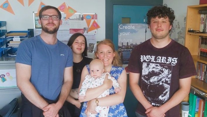 Cian and his friends and Dr. Jeannine Jud, Cian's former lecturer, with her 3 month baby Oisín