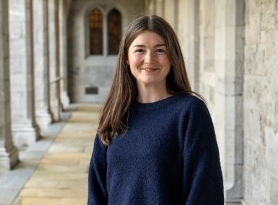 Saoirse posing for a picture in the quadrangle
