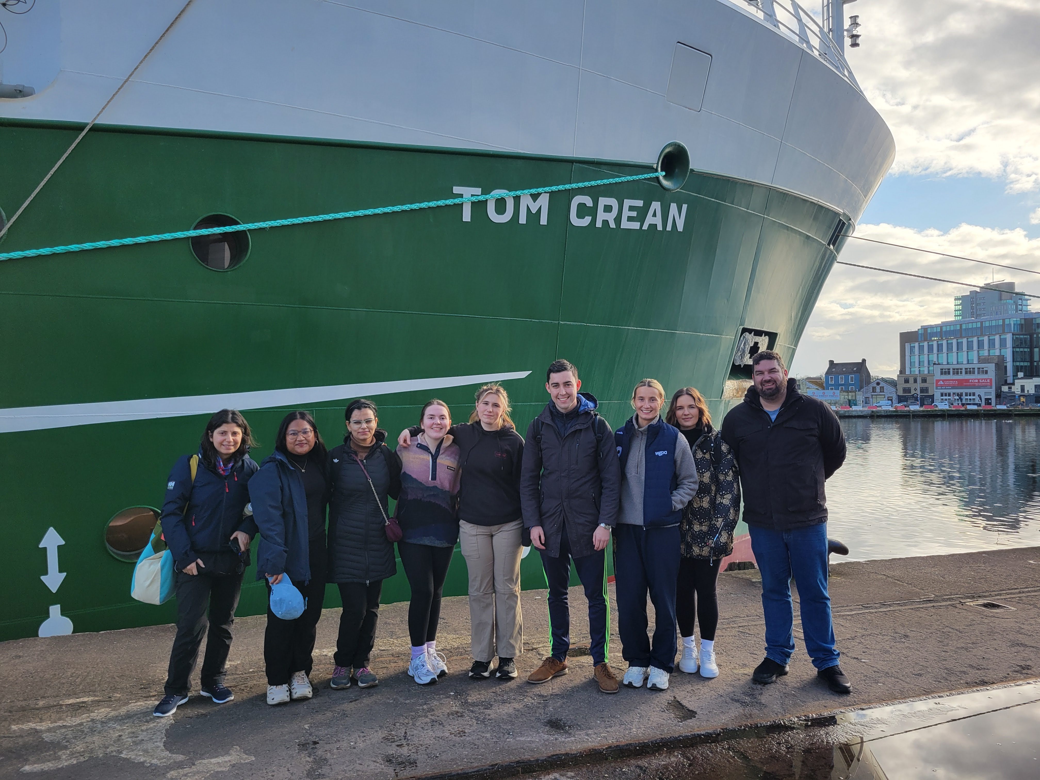 students disembarking research vessel