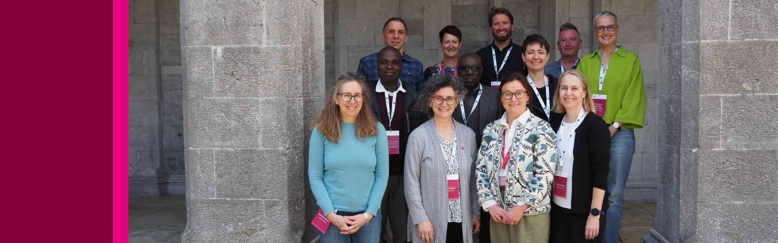 Staff delegation outside University building
