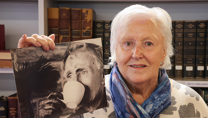 Dr Mary Warde Moriarty with a photo of her father Edward Warde.