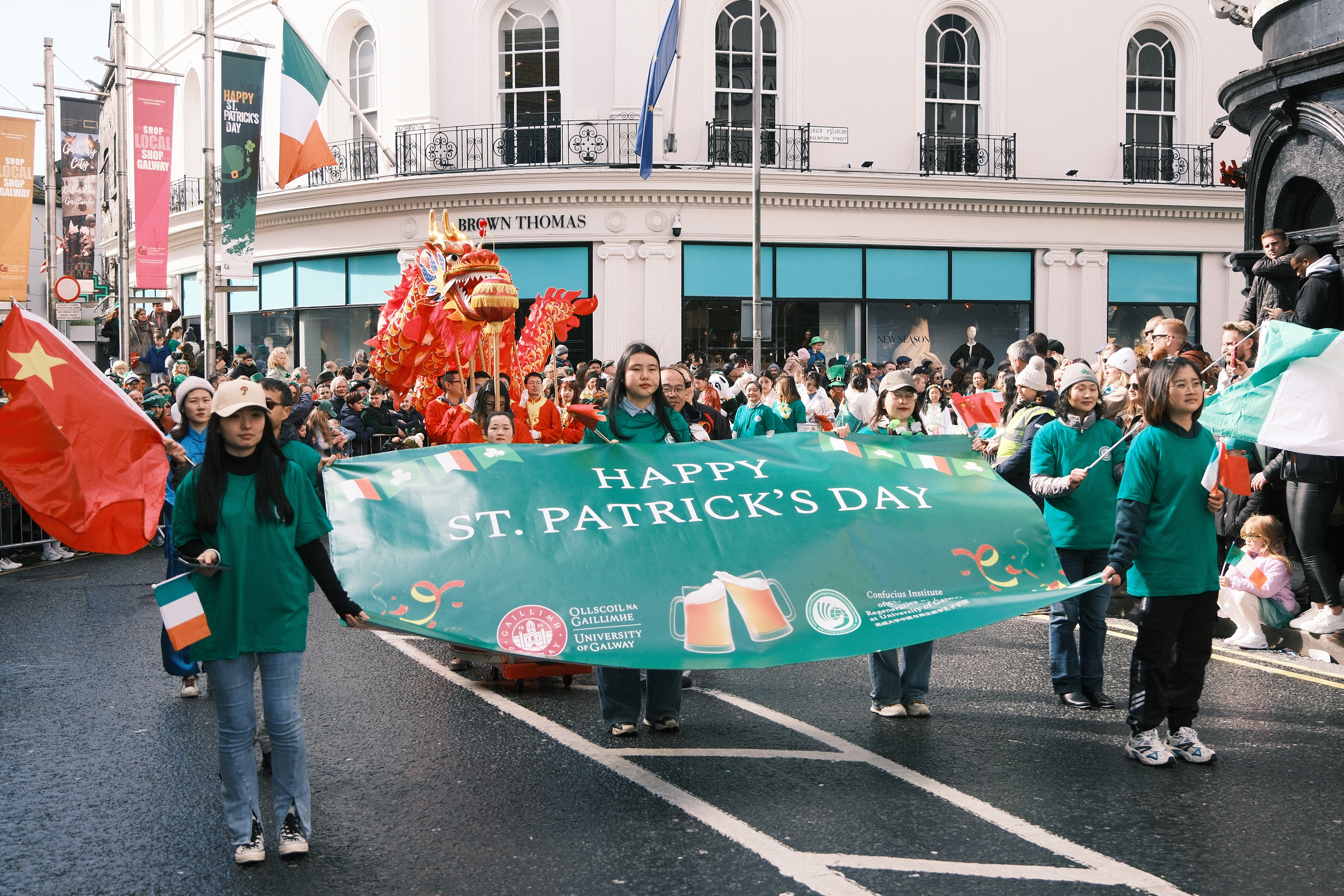 Galway team holding the Happy St Patricks Day Banner