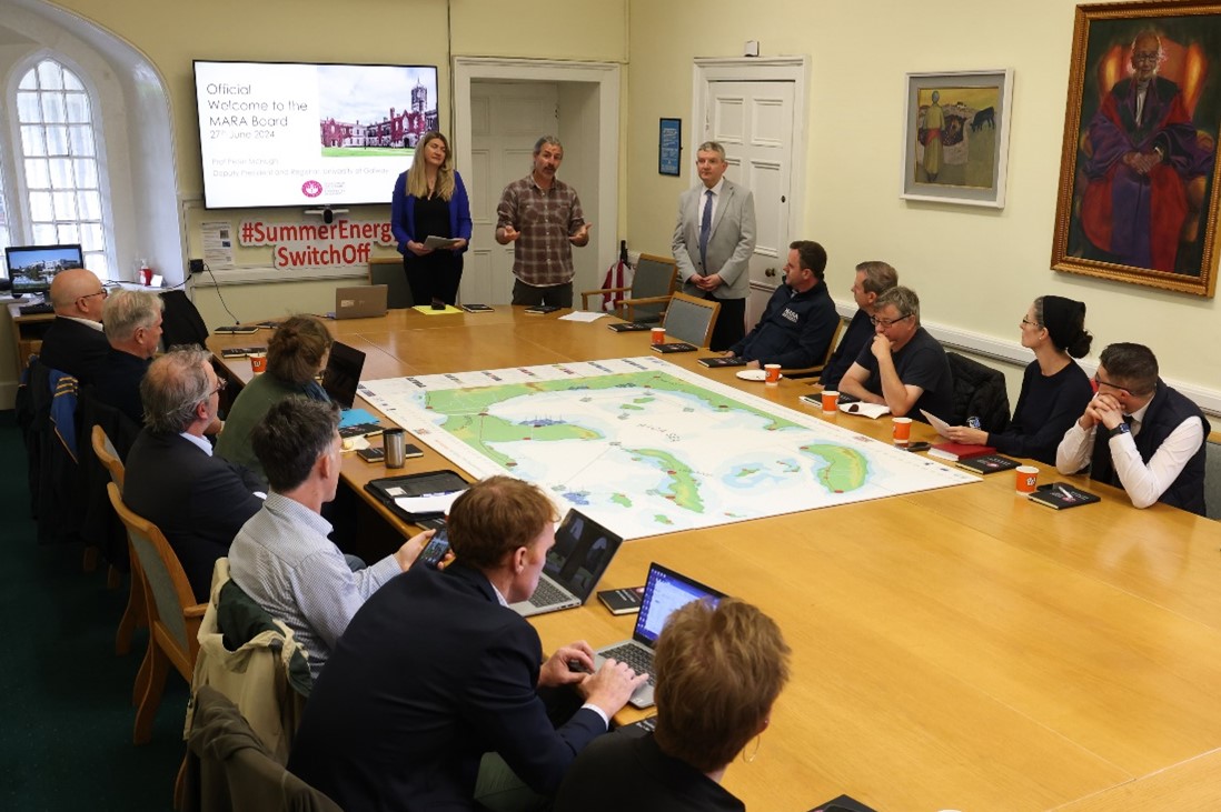 Dr Liam Carr presents the Marine Spatial Planning board game to the MARA board