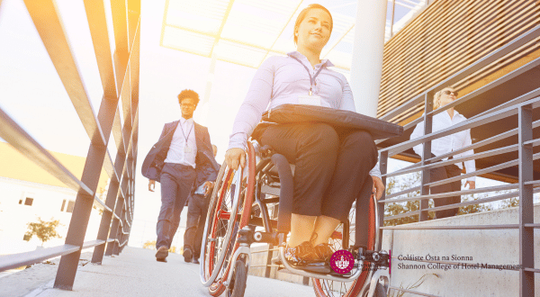 wheelchair and people walking