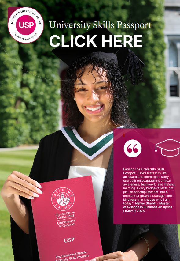 Student in Graduation robes holding a university Skills Passport brochure