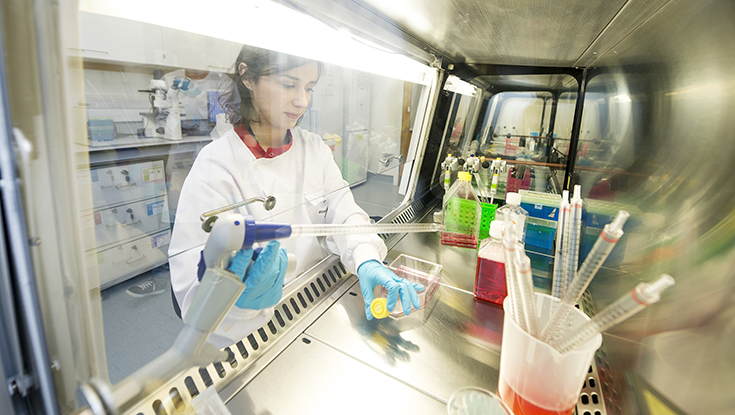 A scientist works in a C&Uacute;RAM lab at NUI Galway. Photo