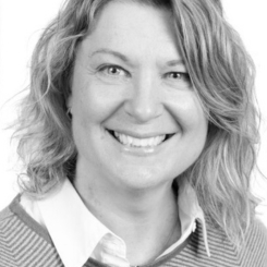 A headshot of Dr. Shirley Hanley, in black and white